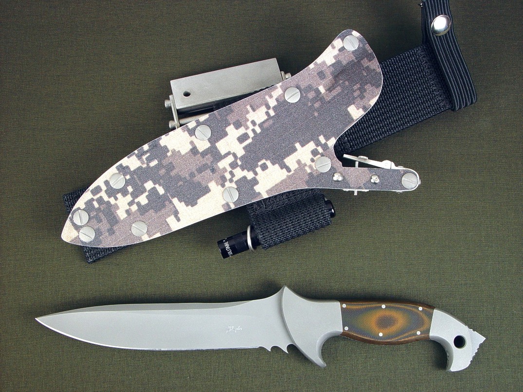 "Anzu" fine combat, tactical knife, obverse side view in CPMS30V high vanadium tool steel blade, 304 stainless steel bolsters, Tiger Stripe G10 fiberglass epoxy laminate composite handle, digi-camo desert kydex locking sheath with ultimate extender package and accessories "Anzu" fine combat, tactical knife, obverse side view in CPMS30V high vanadium tool steel blade, 304 stainless steel bolsters, Tiger Stripe G10 fiberglass epoxy laminate composite handle, digi-camo desert kydex locking sheath with ultimate extender package and accessories