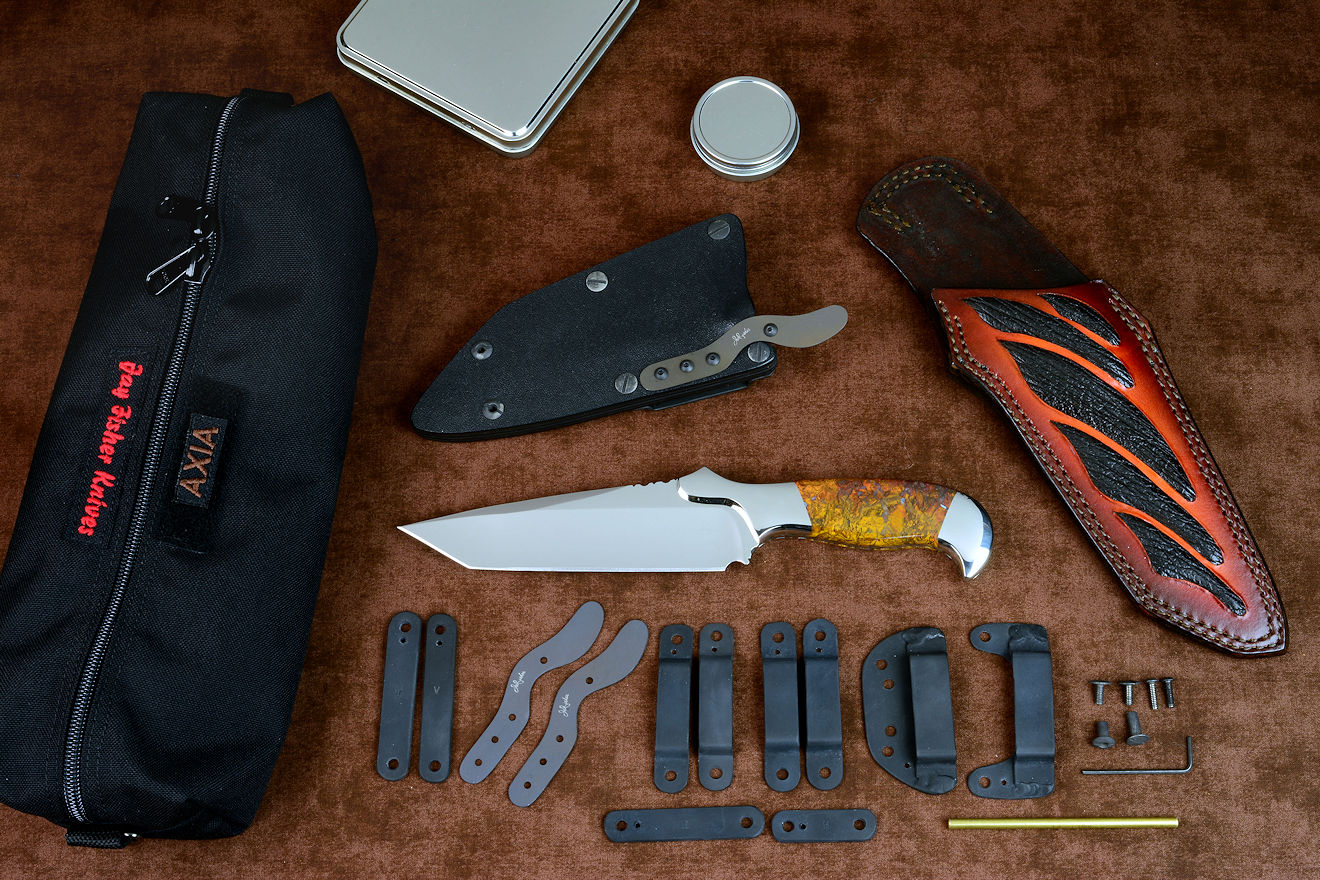 "Axia" Custom tactical knife, obverse side view in CPM 154CM powder metal high molybdenum martensitic stainless steel blade, T3 cryogenically treated blade, 304 stainless steel bolsters, Polvadera Jasper gemstone handle, hybrid tension-locking sheath in kydex, anodized aluminum, stainless steel, titanium, sheath in hand-carved leather shoulder inlaid with sharkskin, mouting and hardware kit, mini-duffle "Axia" Custom tactical knife, obverse side view in CPM 154CM powder metal high molybdenum martensitic stainless steel blade, T3 cryogenically treated blade, 304 stainless steel bolsters, Polvadera Jasper gemstone handle, hybrid tension-locking sheath in kydex, anodized aluminum, stainless steel, titanium, sheath in hand-carved leather shoulder inlaid with sharkskin, mouting and hardware kit, mini-duffle