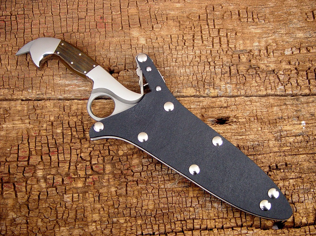 "Azophi" tactical combat knife, obverse side view in ATS-34 high molybdenum stainless steel blade, 304 stainless steel bolsters, Lignum Vitae hardwood handle, locking kydex, aluminum, stainless steel sheath "Azophi" tactical combat knife, obverse side view in ATS-34 high molybdenum stainless steel blade, 304 stainless steel bolsters, Lignum Vitae hardwood handle, locking kydex, aluminum, stainless steel sheath