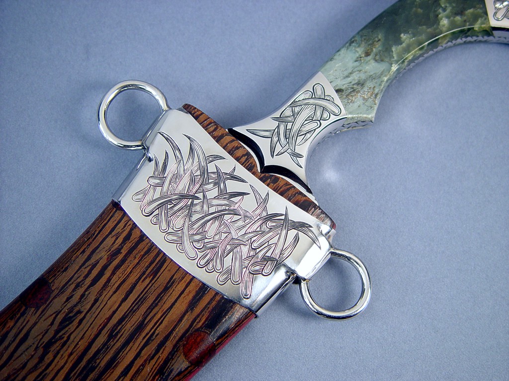 Hand-engraved, handmade stainless steel components, chape detail in 304 stainless steel in "Desert Wind" Persian dagger at Sharp Instinct Studio Hand-engraved, handmade stainless steel components, chape detail in 304 stainless steel in "Desert Wind" Persian dagger at Sharp Instinct Studio