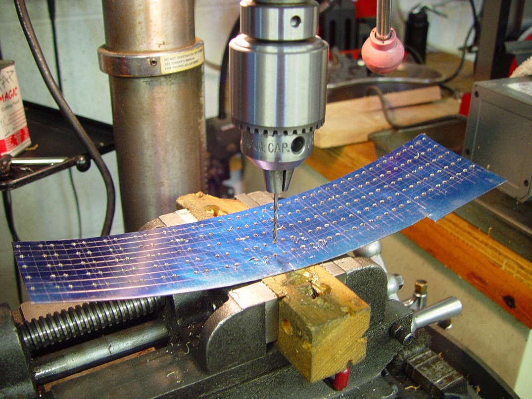 Hand-making military combat grade stainless steel locksheath spring retaining plates at Sharp Instinct Studio Hand-making military combat grade stainless steel locksheath spring retaining plates at Sharp Instinct Studio