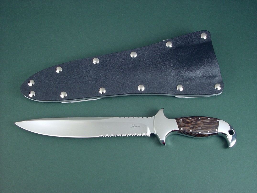 "Macha EL" obverse side view in 440C high chromium stainless steel blade, 304 stainless steel bolsters, Black Palm Wood hardwod handle, tension fit kydex, aluminum, stainless steel sheath "Macha EL" obverse side view in 440C high chromium stainless steel blade, 304 stainless steel bolsters, Black Palm Wood hardwod handle, tension fit kydex, aluminum, stainless steel sheath