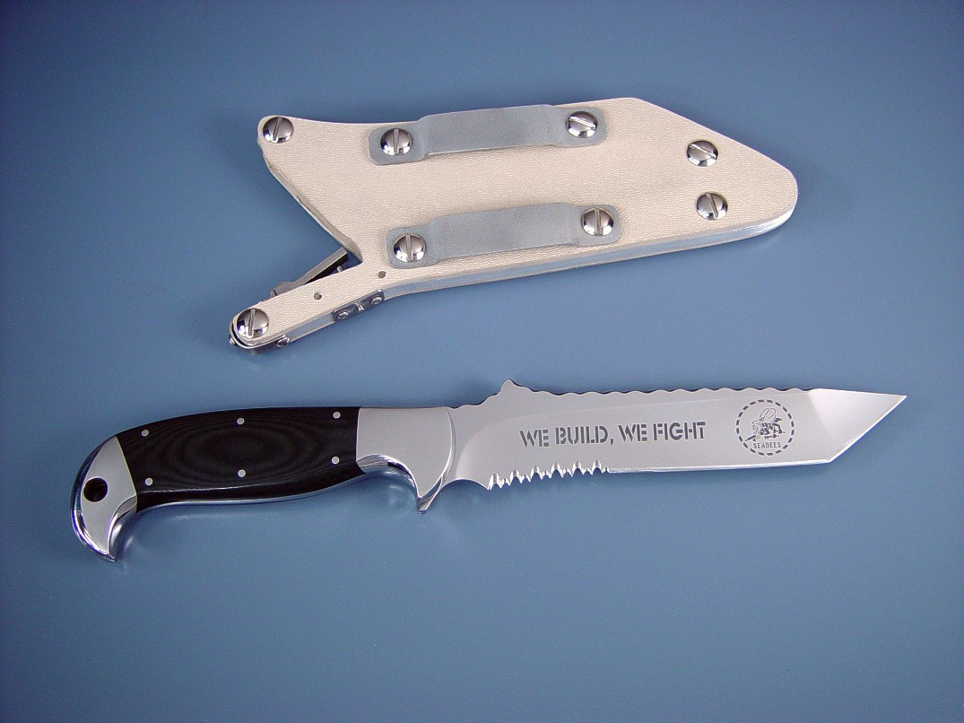"Seabee" Obverse view. ATS-34 high molybdenum stainless steel blade, 304 stainless steel bolsters, canvas micarta phenolic handle, locking kydex, aluminum stainless steel, nickel plated steel sheath "Seabee" Obverse view. ATS-34 high molybdenum stainless steel blade, 304 stainless steel bolsters, canvas micarta phenolic handle, locking kydex, aluminum stainless steel, nickel plated steel sheath