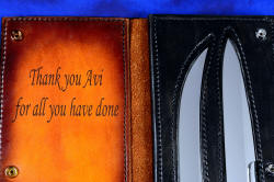 "Bordeaux and Courbe" Professional grade chef's/BBQ knives, laser engraving and dye detail of inside cover, case in American Bison, heavy leather shoulder, stainless steel snaps, nylon stitching. 