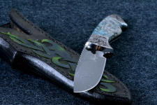 "Thuban" blade point detail. The drop point is thin and super sharp at the tip, with good belly and blade strength. The sheath is thick and strong. "Thuban" blade point detail. The drop point is thin and super sharp at the tip, with good belly and blade strength. The sheath is thick and strong.