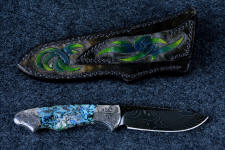 "Thuban" reverse side view. Note carving and hand-dying on sheath back and on belt loop, stitched with nylon "Thuban" reverse side view. Note carving and hand-dying on sheath back and on belt loop, stitched with nylon