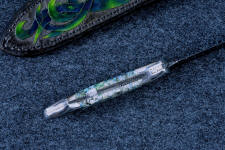 "Thuban" inside handle tang detail. Bright lighting shows highlights of polished and blued steel. Bolsters are dovetailed to lock and protect handle scales to the tang "Thuban" inside handle tang detail. Bright lighting shows highlights of polished and blued steel. Bolsters are dovetailed to lock and protect handle scales to the tang