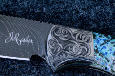 "Thuban" Six power enlargement of obverse side front bolster engraving. Yo can see the reflection of the camera in this photo! "Thuban" Six power enlargement of obverse side front bolster engraving. Yo can see the reflection of the camera in this photo!