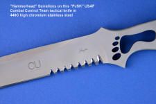 Hammerhead serrations on fine tactical combat knife Hammerhead serrations on fine tactical combat knife