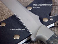 "Vampire" rip tooth serrations on combat tactical knife. Alternating large, small cuts increase agressiveness "Vampire" rip tooth serrations on combat tactical knife. Alternating large, small cuts increase agressiveness